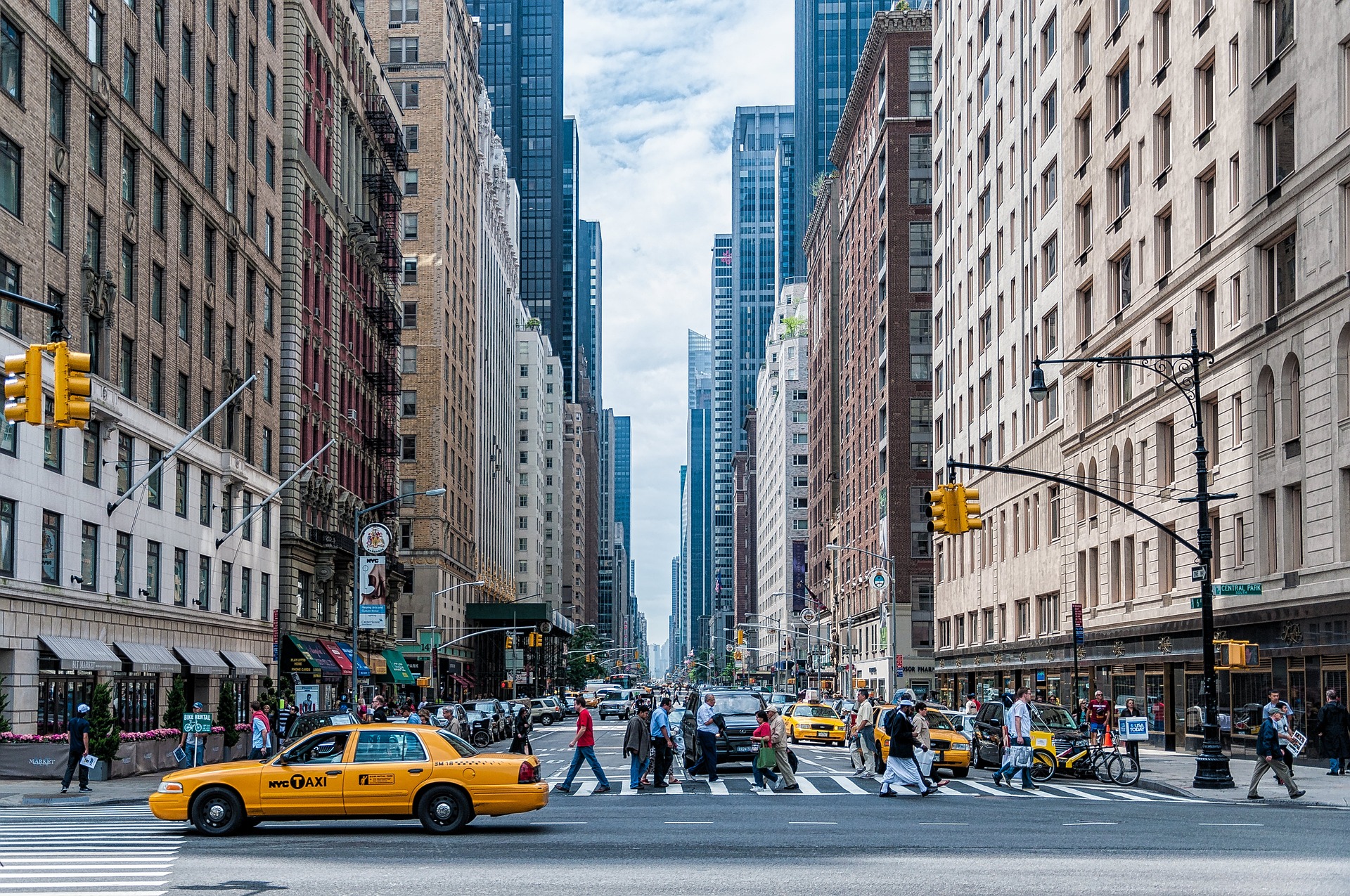 Cityscape taxicab pedestrians crosswalk spring weather